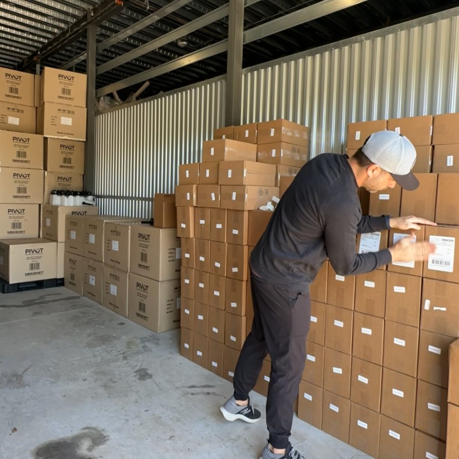 Tyler packing PIVOT orders in the warehouse